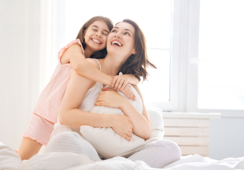 mother and daughter hugging - radon testing